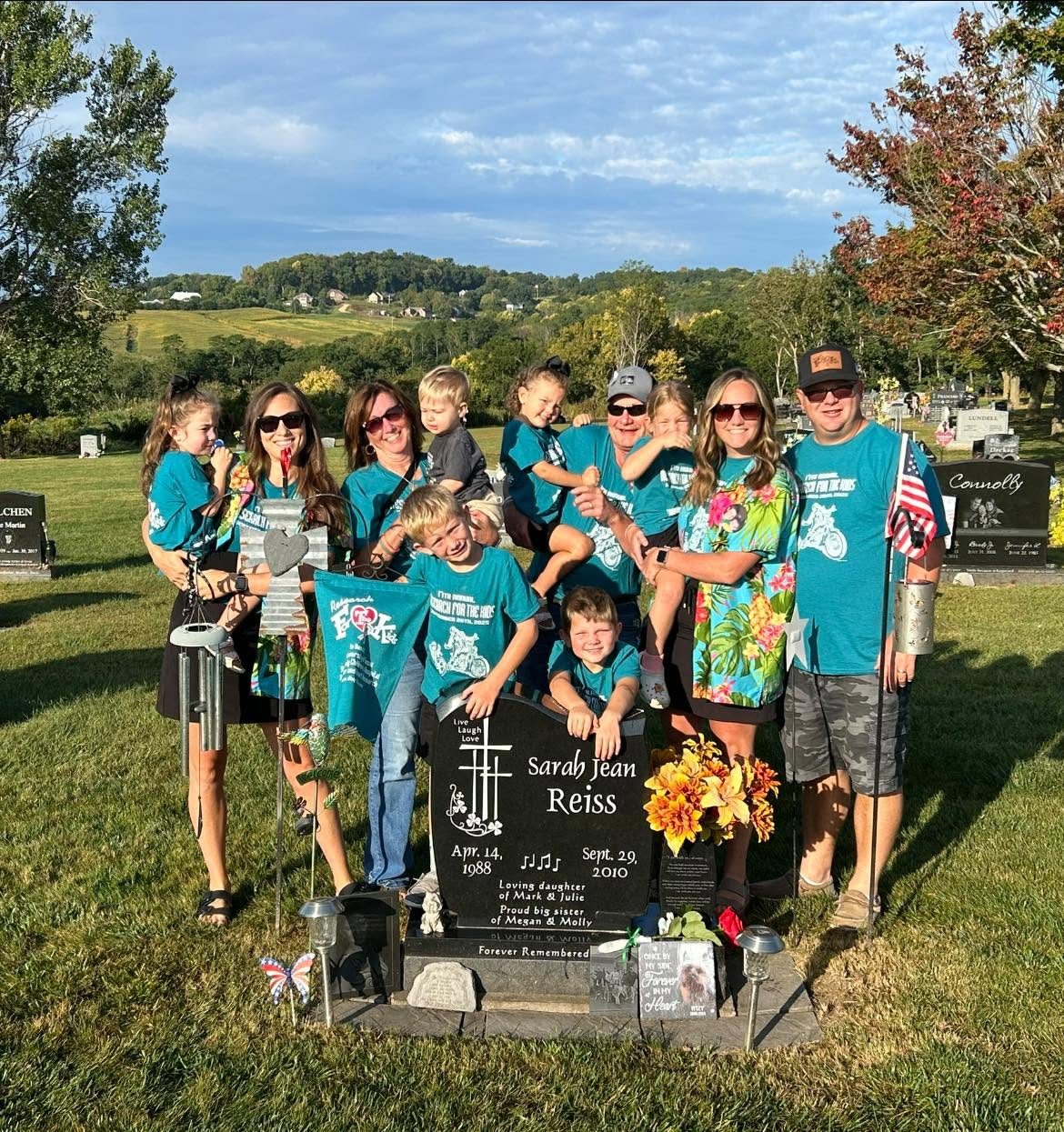 The Reiss family gathered together in Research For The Kids shirts